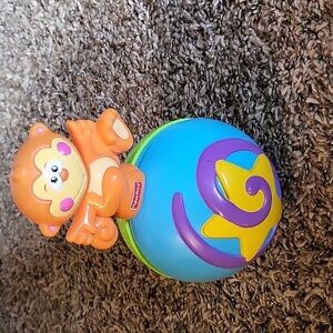 Rolling monkey toy
